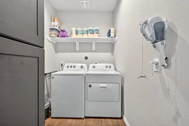 a utility room with dryer and washer