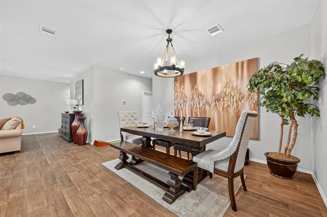 a view of a livingroom with furniture and a table