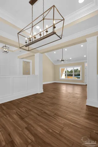 a kitchen with a sink stainless steel appliances and cabinets