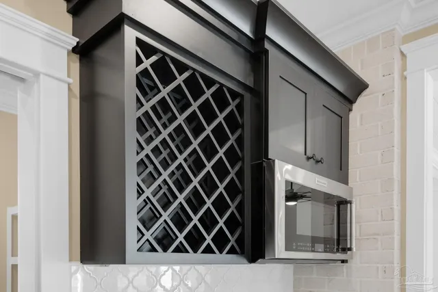 a bathroom with a sink vanity and a mirror