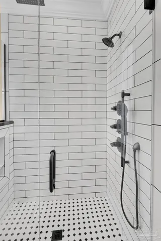 a bathroom with a double vanity sink toilet and a mirror