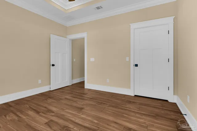 a view of a yard with a large trees