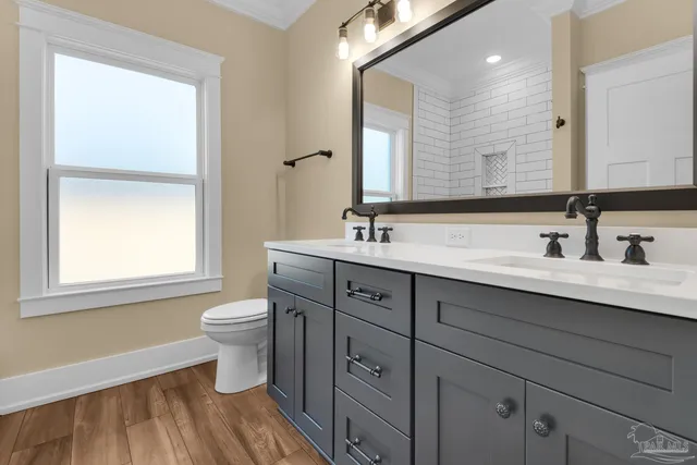 a view of a swimming pool with some sitting area