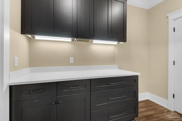 a view of a living room and kitchen view