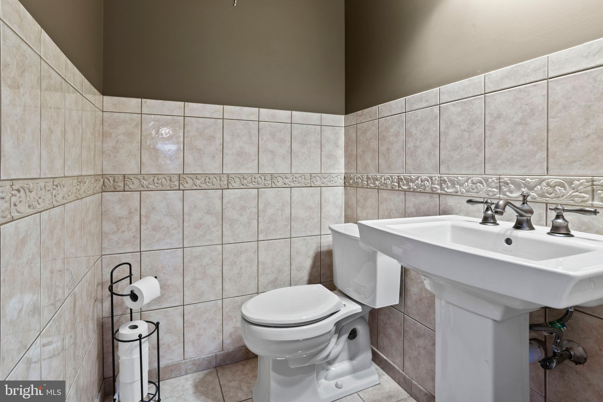 311 Ogden Place Springfield, PA 19064 - Photo 27 of 35 a bathroom with a sink a toilet and shower