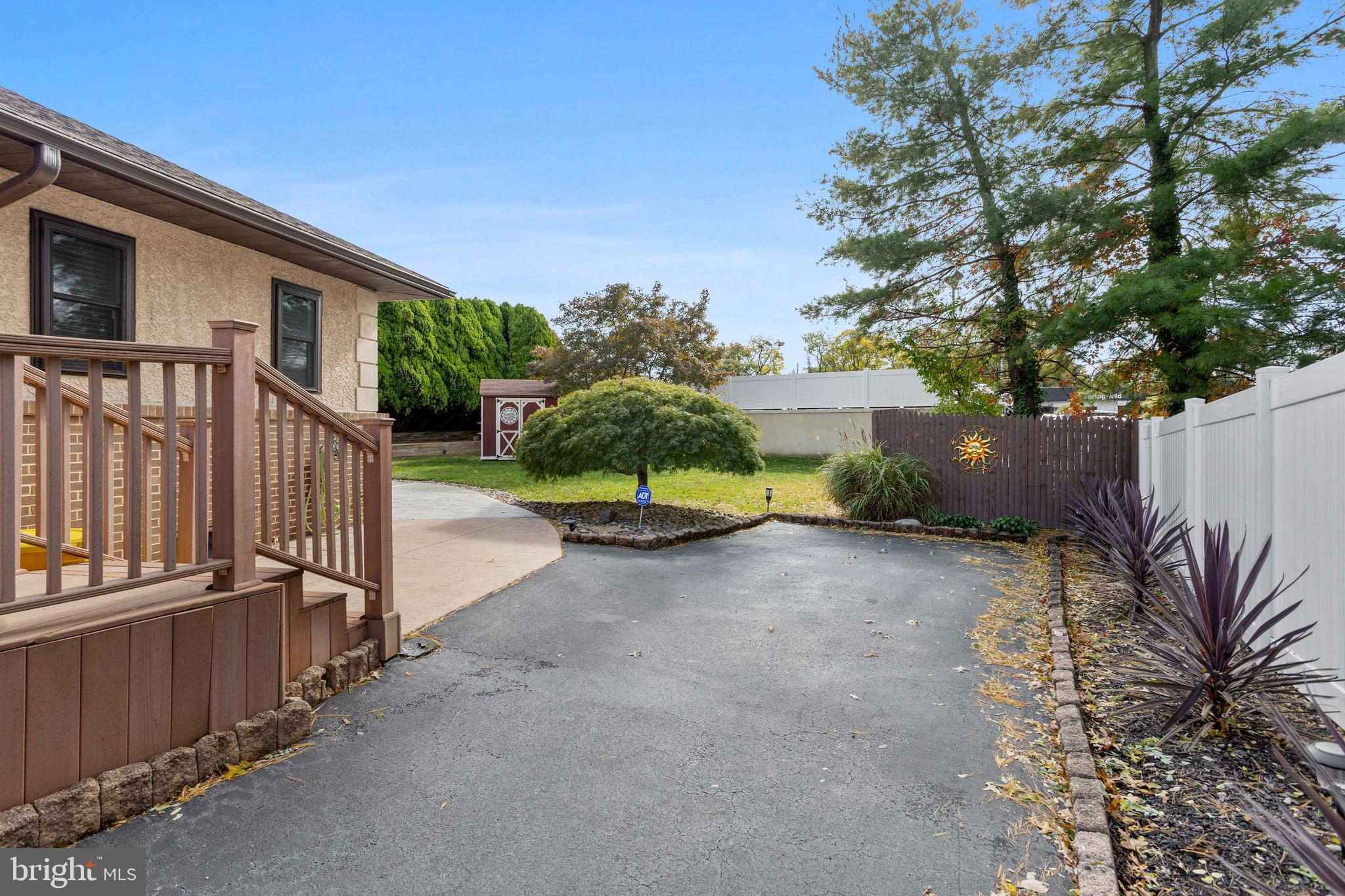 311 Ogden Place Springfield, PA 19064 - Photo 3 of 35 a view of a house with a street