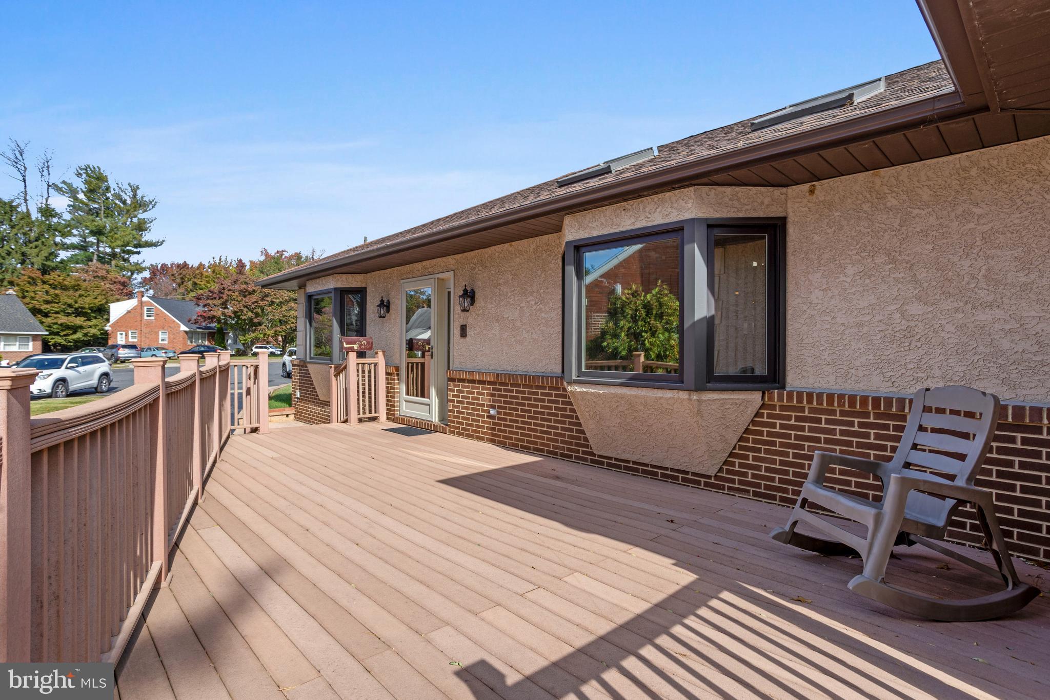 311 Ogden Place Springfield, PA 19064 - Photo 31 of 35 a view of a patio with chair and tables