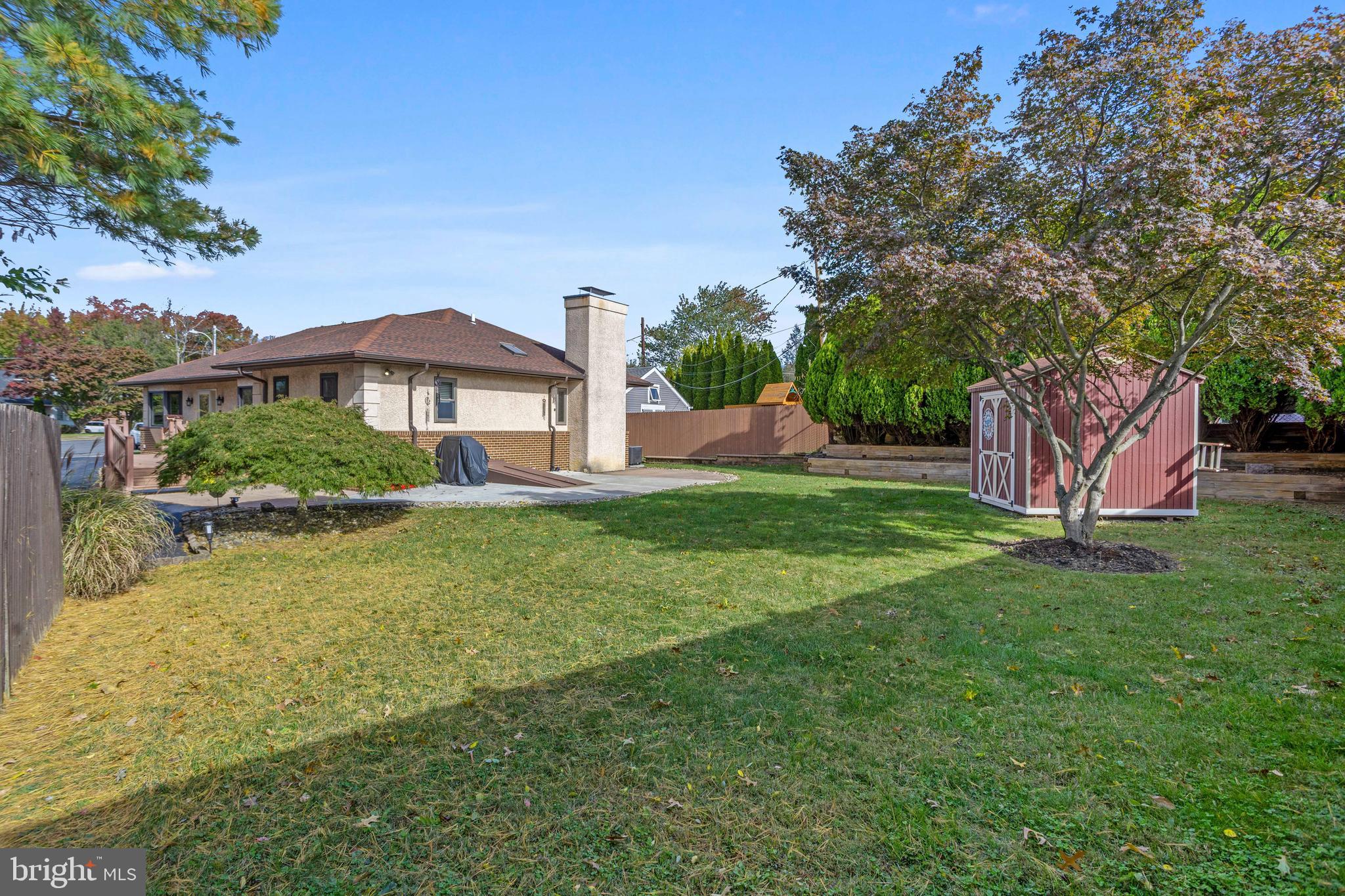 311 Ogden Place Springfield, PA 19064 - Photo 35 of 35 a view of a house with a backyard
