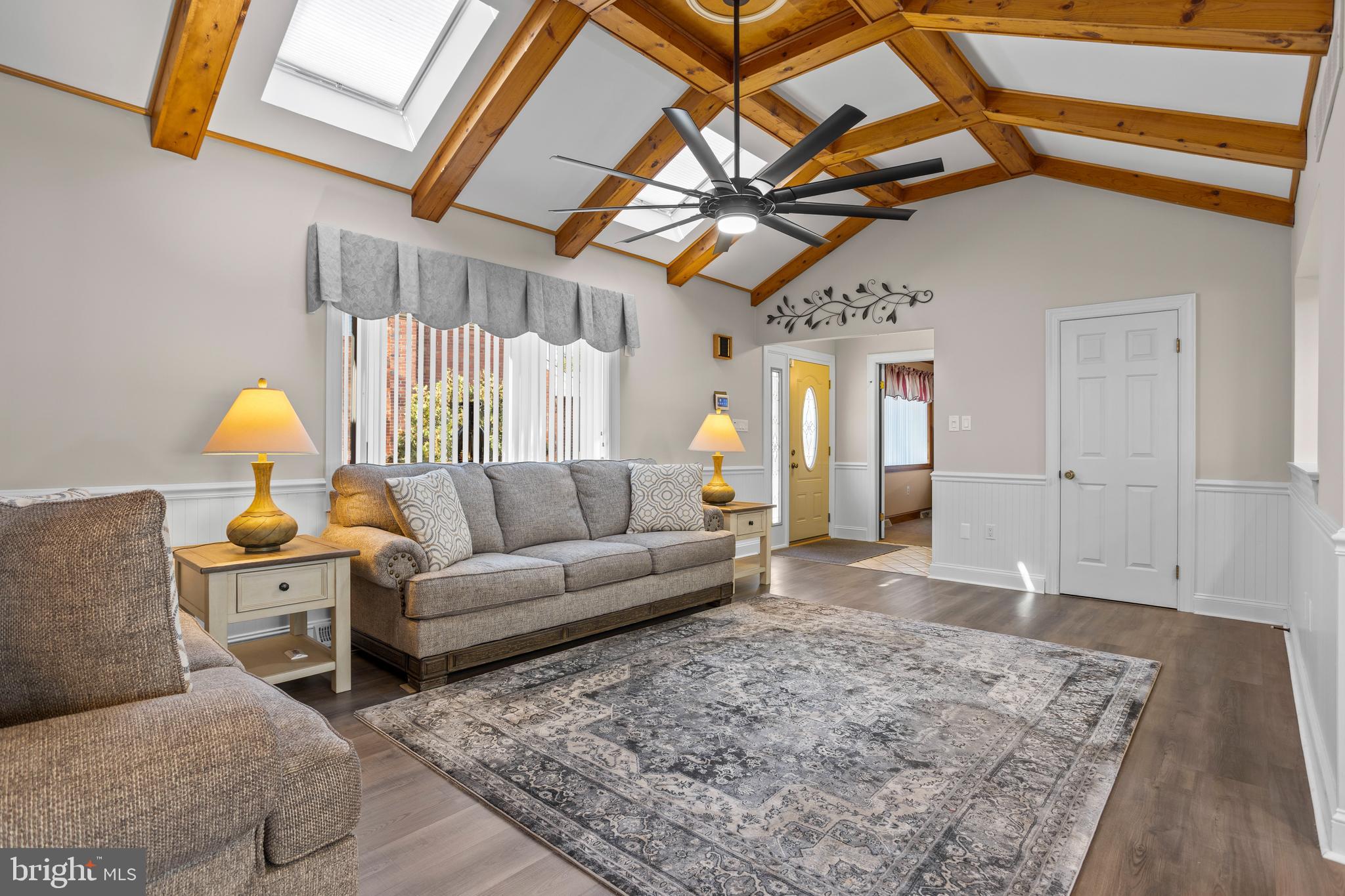 311 Ogden Place Springfield, PA 19064 - Photo 4 of 35 a living room with furniture and wooden floor