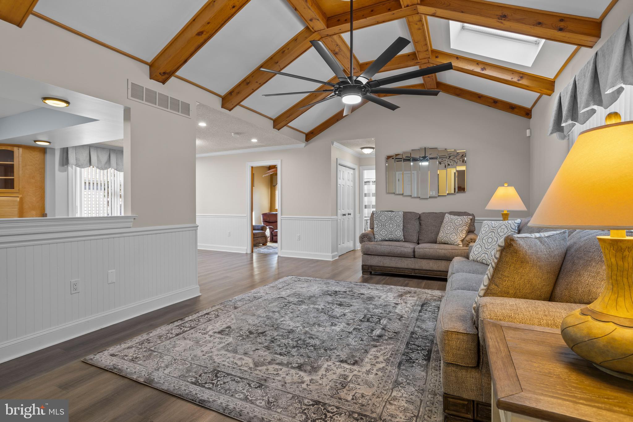 311 Ogden Place Springfield, PA 19064 - Photo 5 of 35 a living room with furniture and a rug