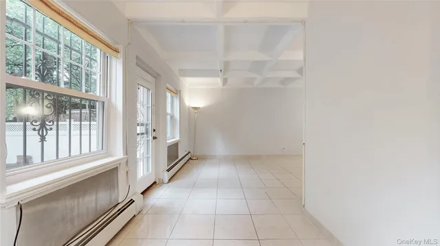 a view of a hallway with a window