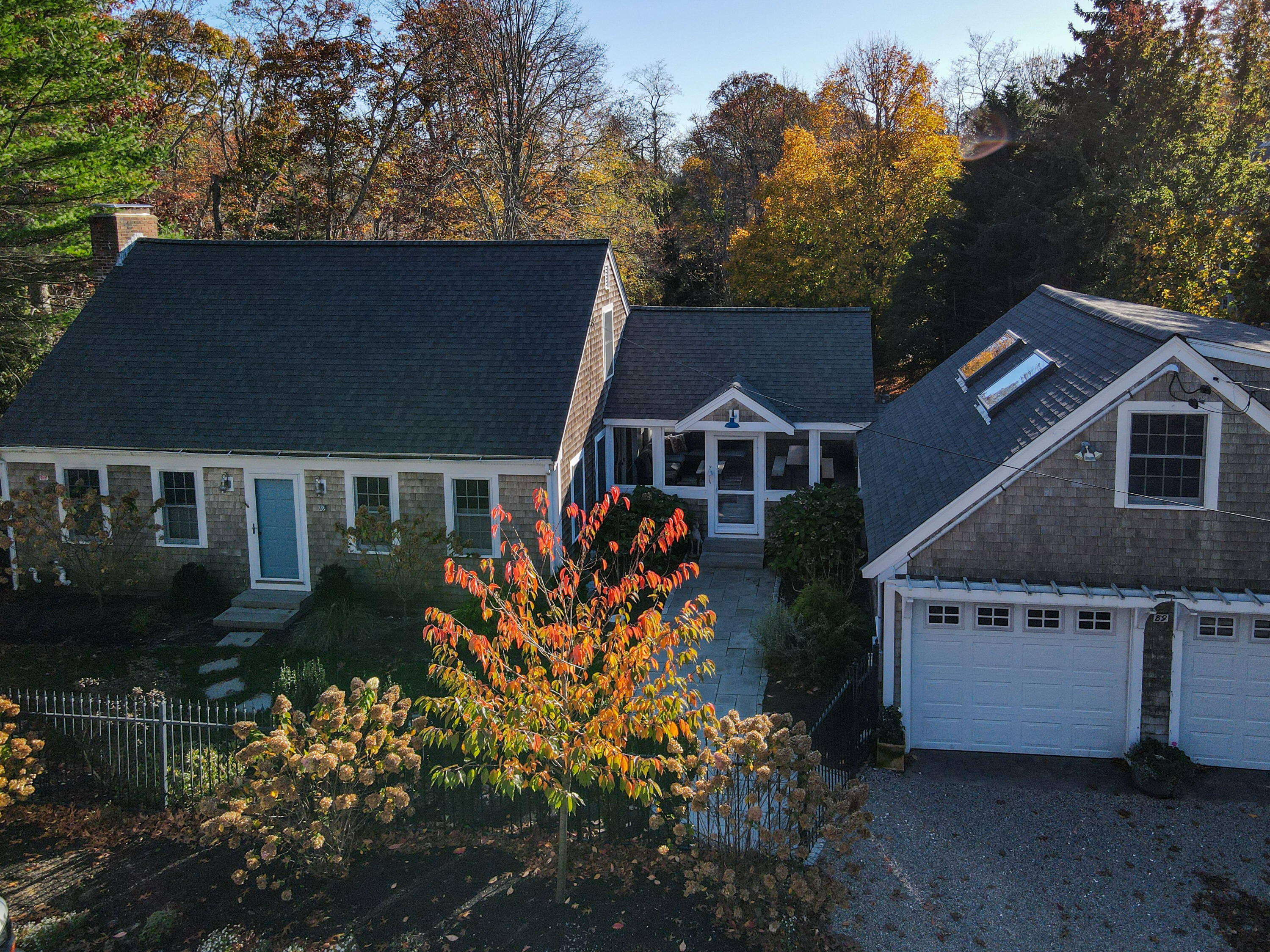 89 Namequoit Road Orleans, MA 02653 - Photo 2 of 42 front view of house with a yard