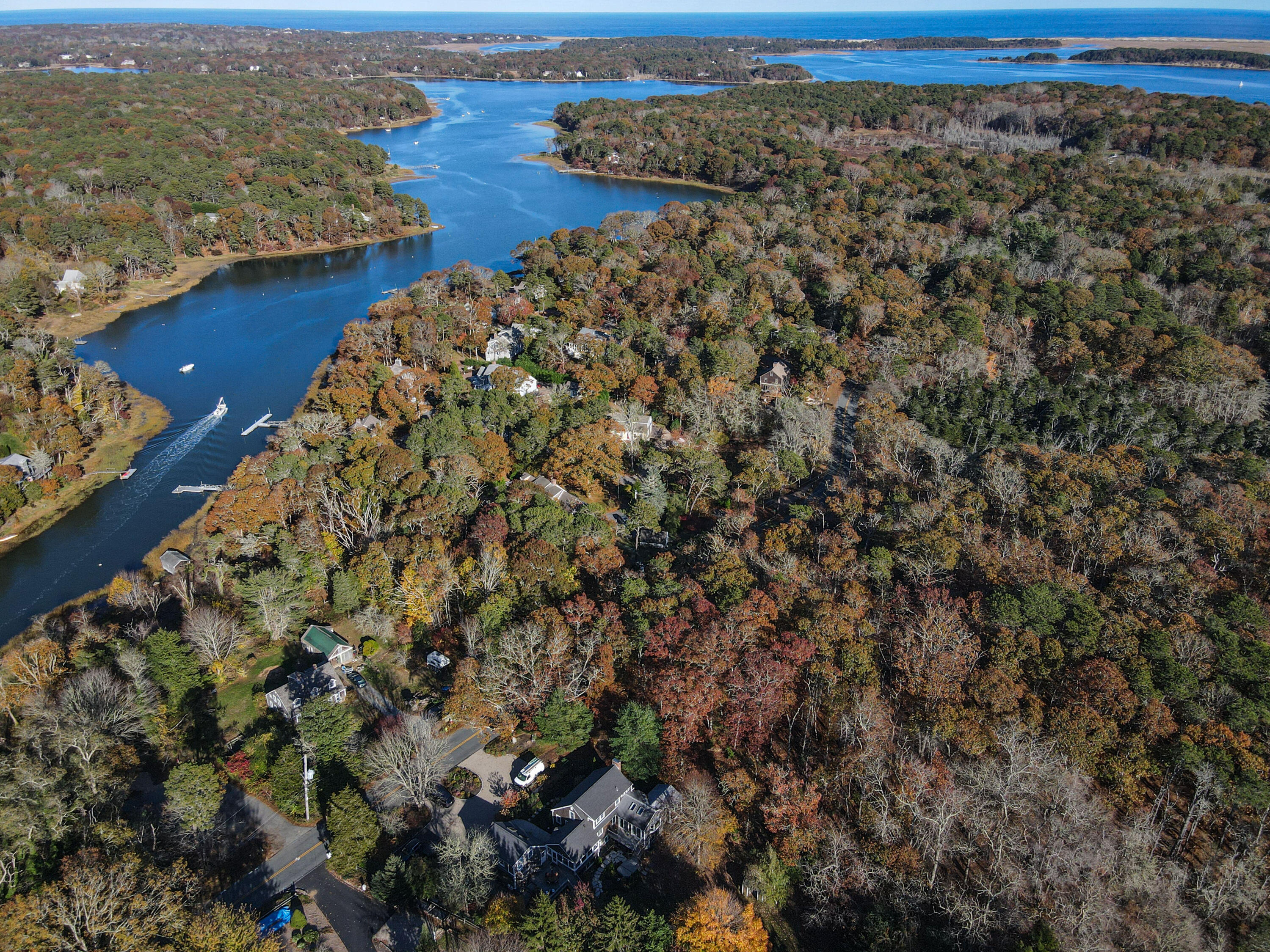 89 Namequoit Road Orleans, MA 02653 - Photo 3 of 42 an aerial view of a house with a yard