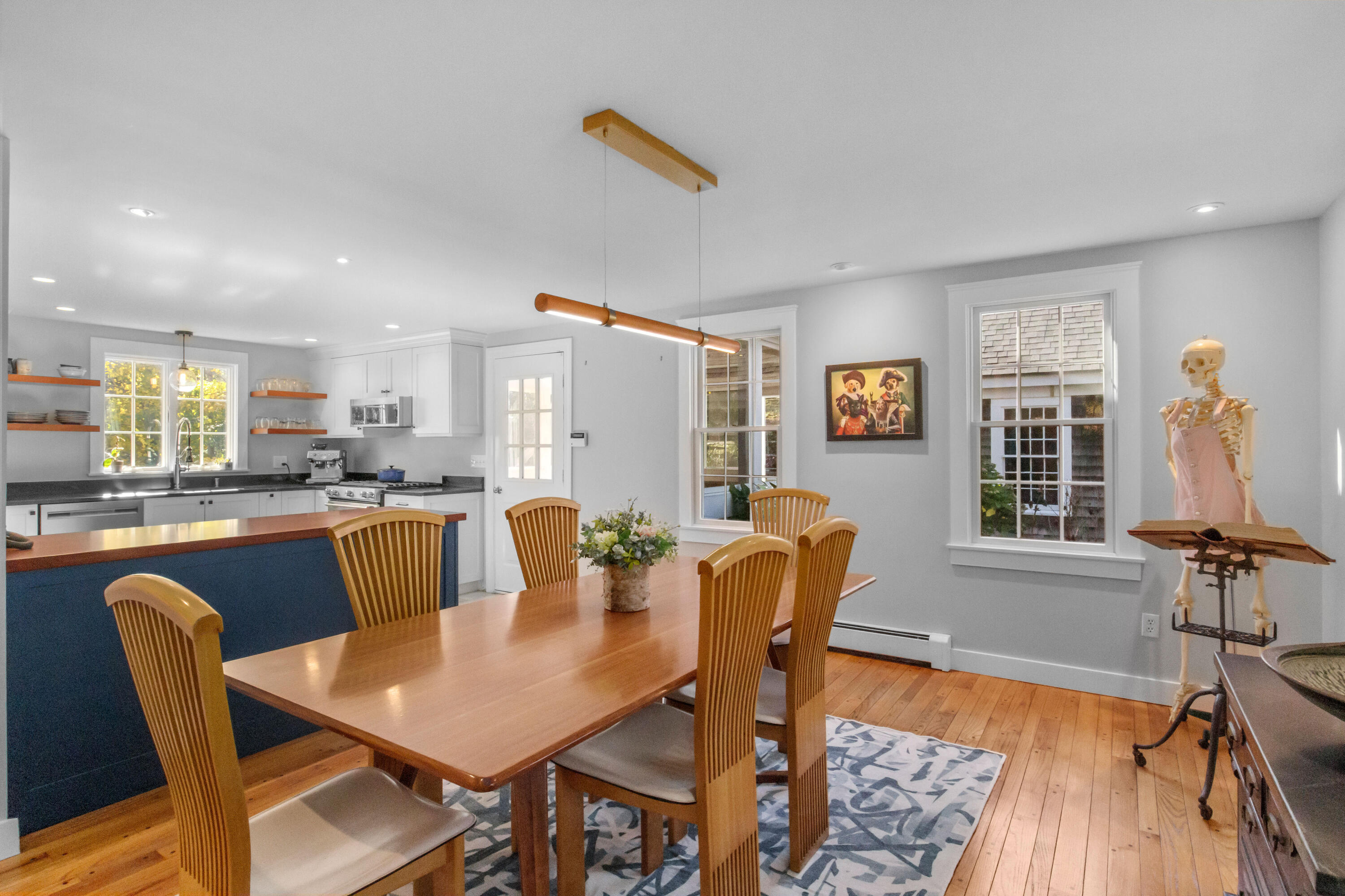 89 Namequoit Road Orleans, MA 02653 - Photo 8 of 42 a view of a dining room with furniture window and wooden floor