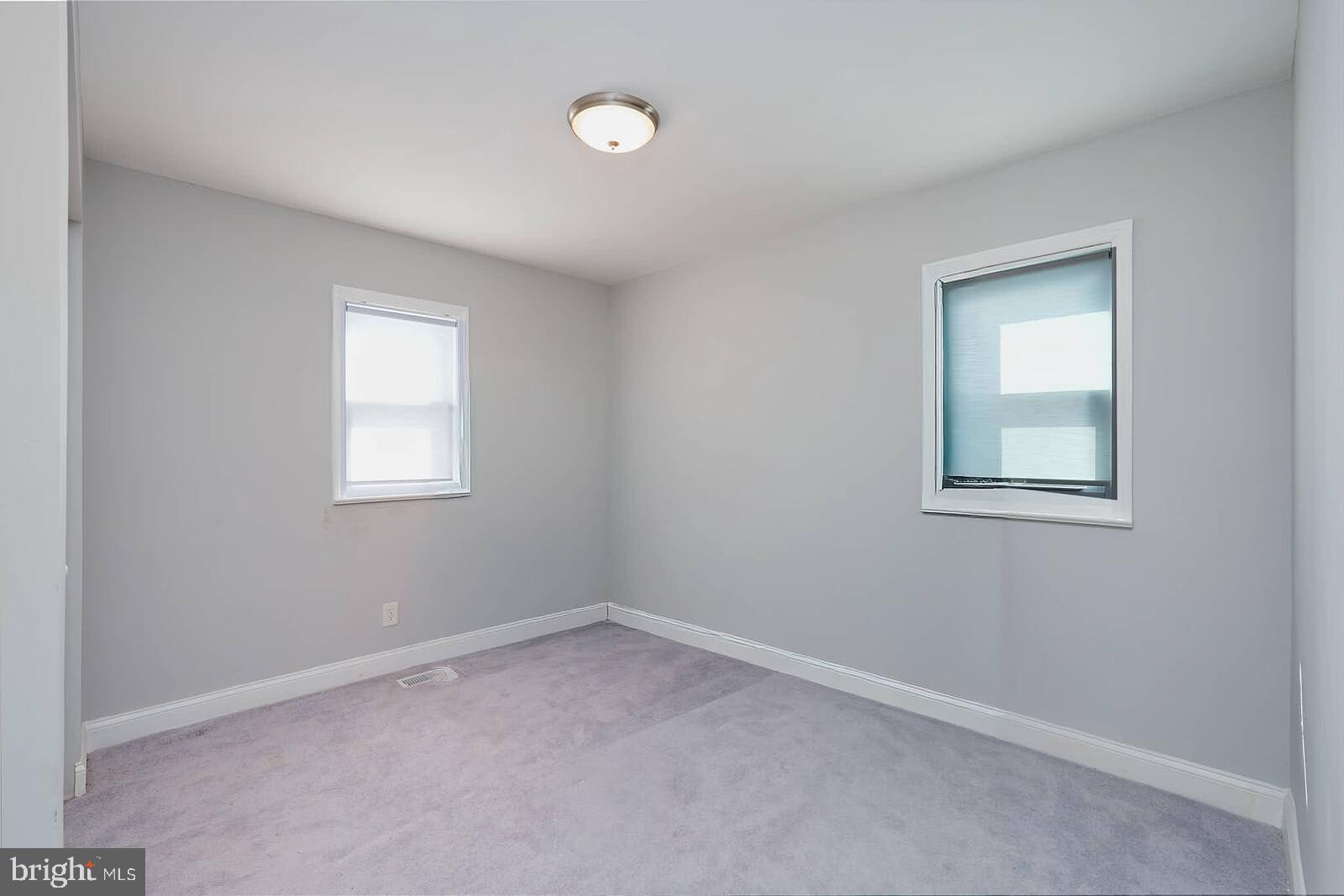 7719 Garrison Road Hyattsville, MD 20784 - Photo 13 of 23 an empty room with a window