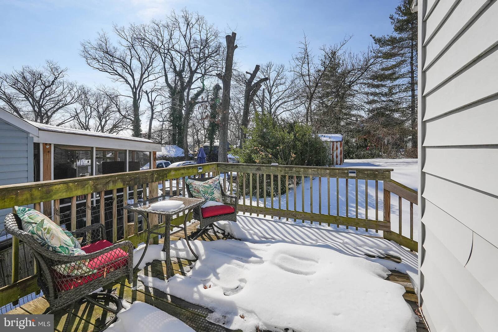 7719 Garrison Road Hyattsville, MD 20784 - Photo 22 of 23 a view of deck with furniture and trees around