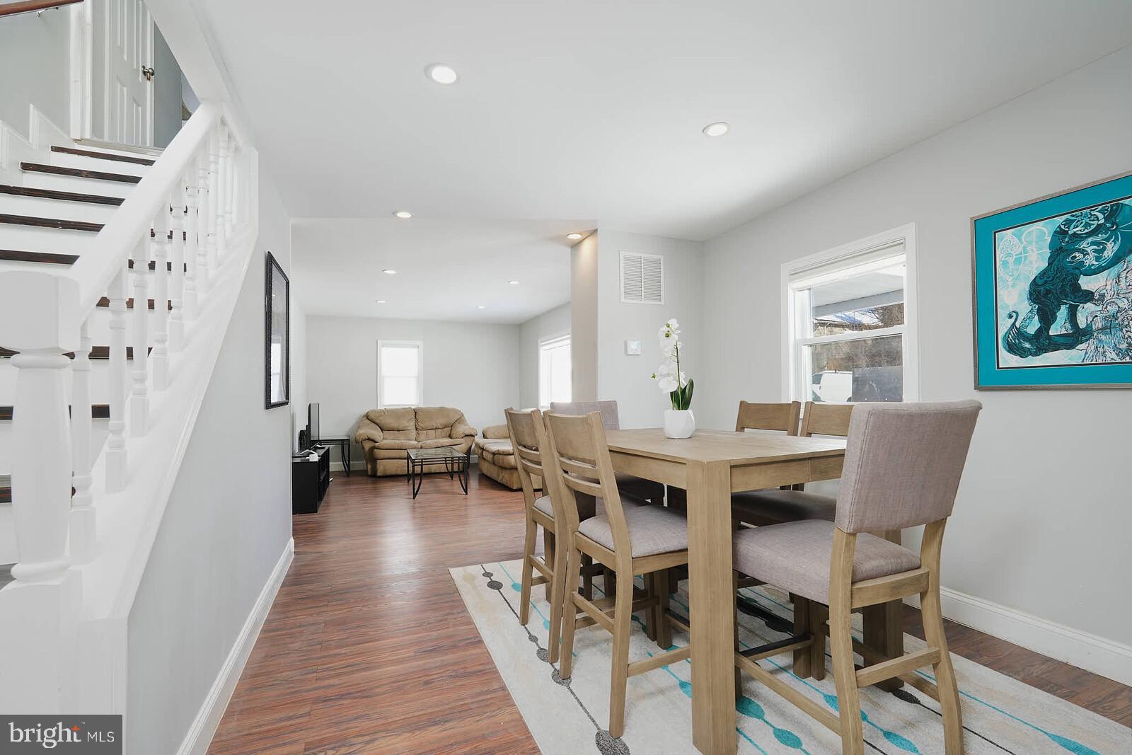 7719 Garrison Road Hyattsville, MD 20784 - Photo 4 of 23 a view of a dining room with furniture window and wooden floor