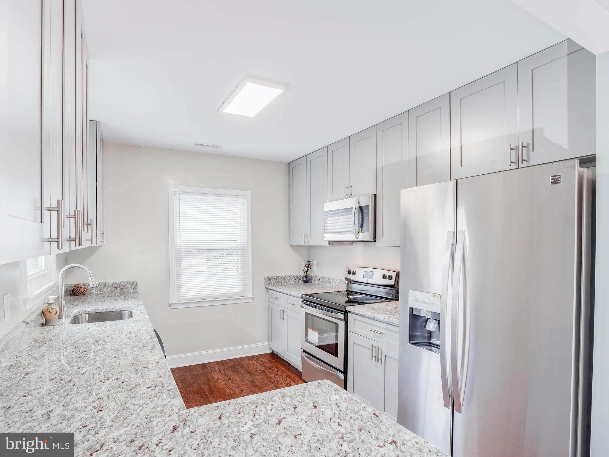 4207 Maple Road Morningside, MD 20746 - Photo 1 of 30 Kitchen - smooth granite + stainless steel
