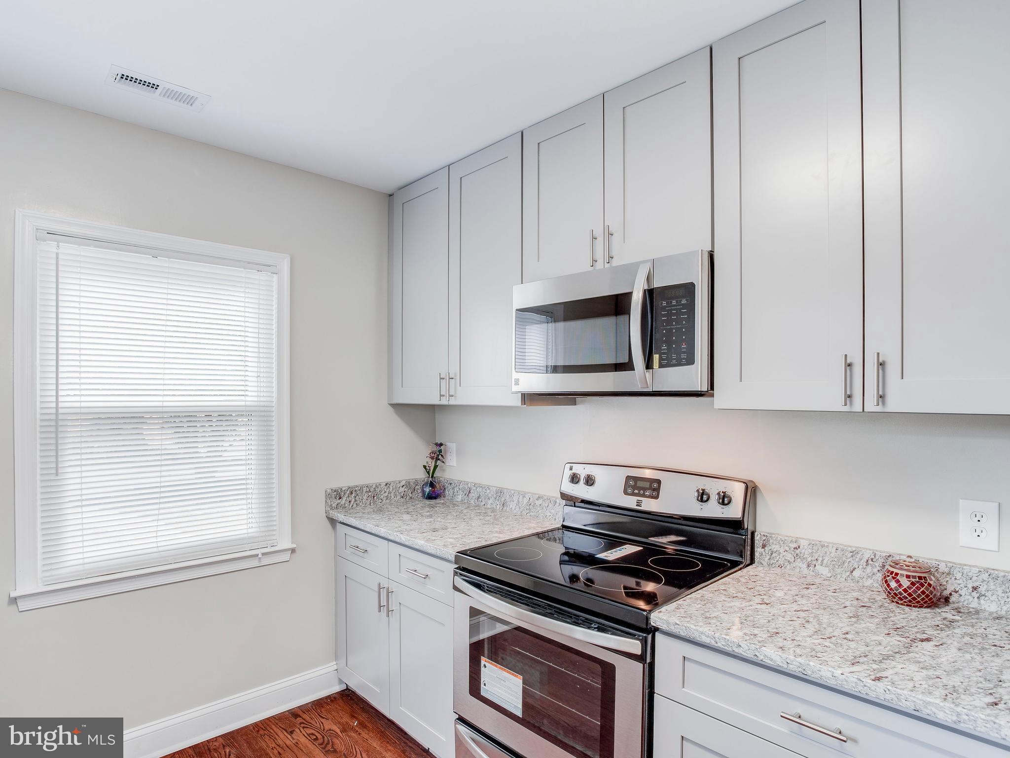 4207 Maple Road Morningside, MD 20746 - Photo 12 of 30 Kitchen - smooth granite + stainless steel