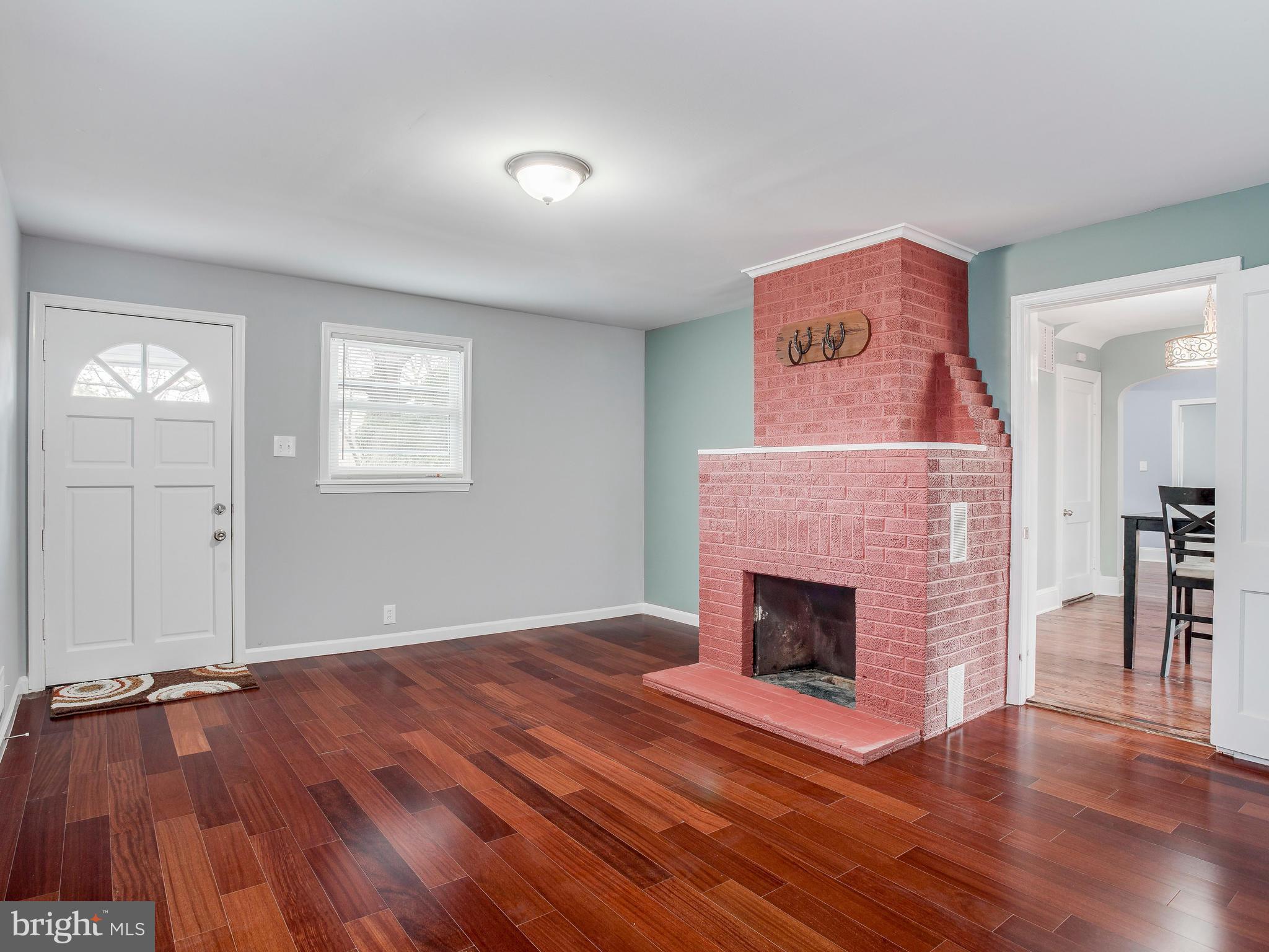 4207 Maple Road Morningside, MD 20746 - Photo 14 of 30 Family Room with wood-burning fireplace