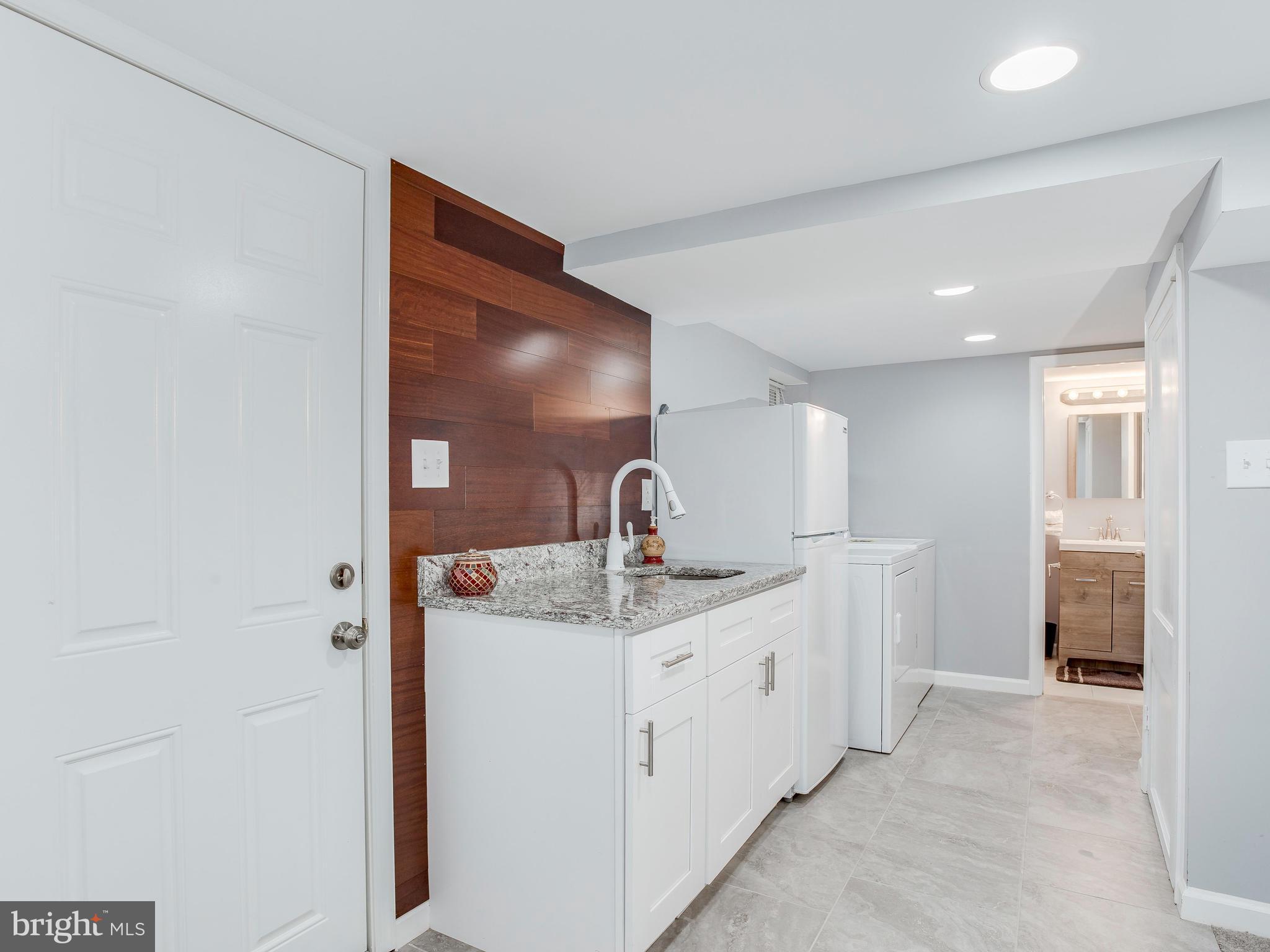 4207 Maple Road Morningside, MD 20746 - Photo 26 of 30 Basement - Wet Bar + Extra Fridge + Washer/Dryer