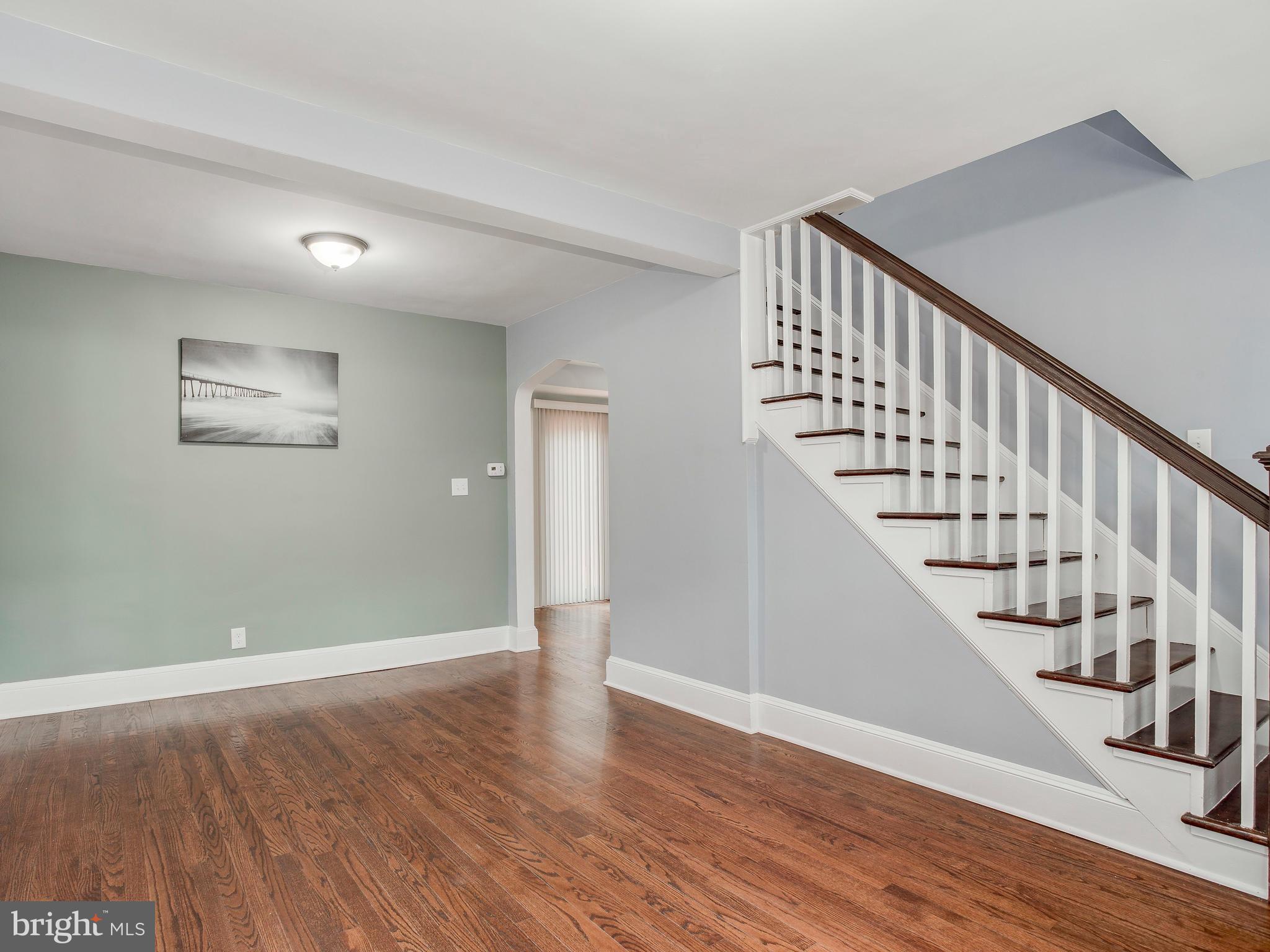 4207 Maple Road Morningside, MD 20746 - Photo 4 of 30 Living Room - rich wood hardwood floors