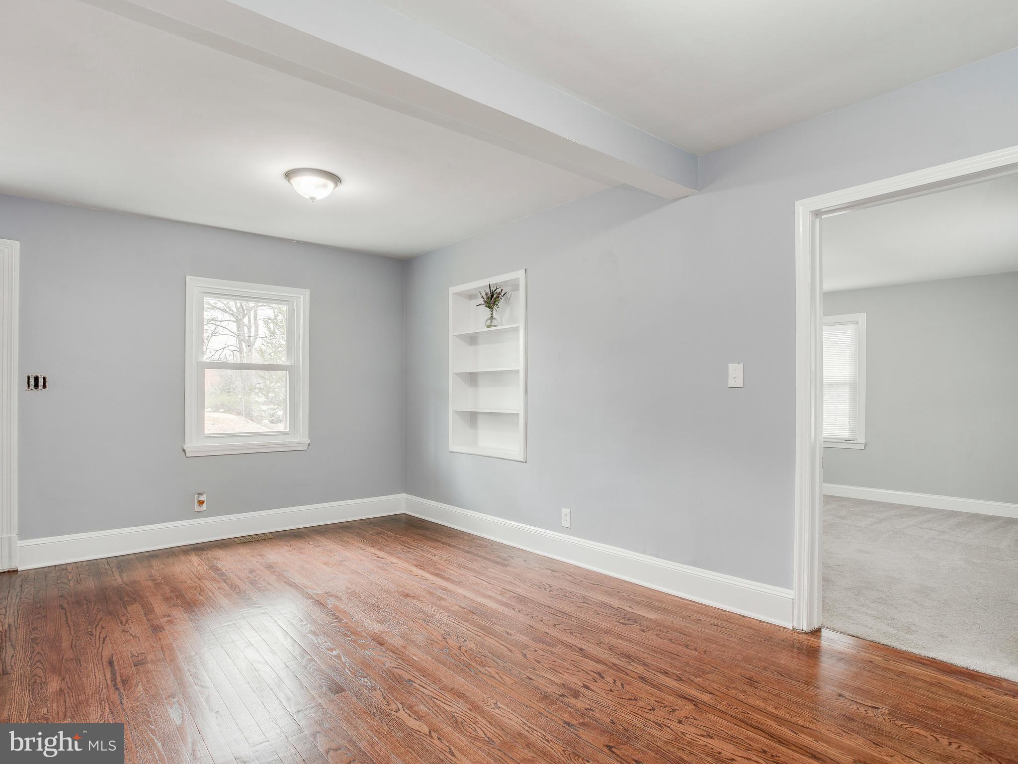 4207 Maple Road Morningside, MD 20746 - Photo 5 of 30 Living Room - rich wood hardwood floors