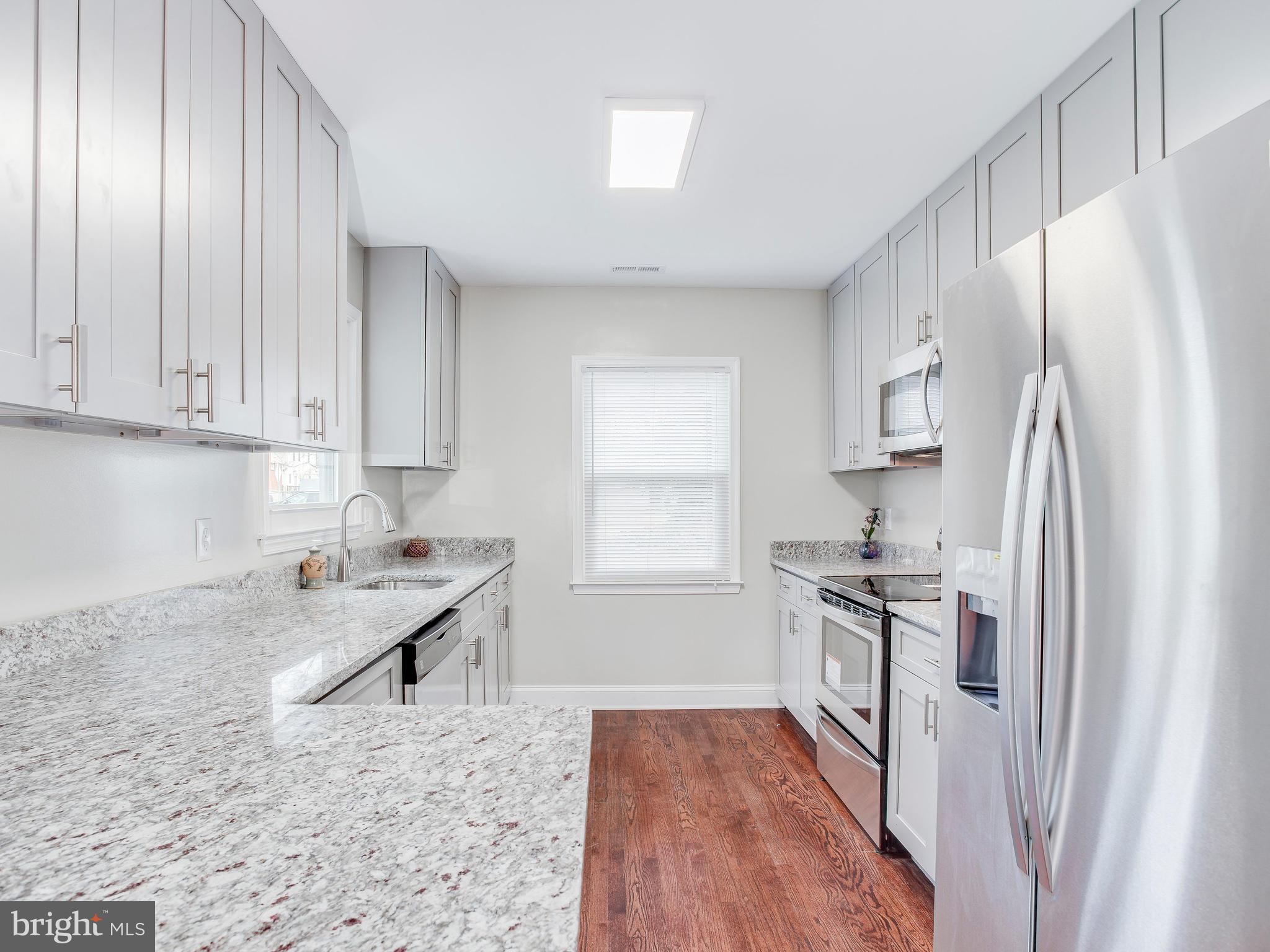 4207 Maple Road Morningside, MD 20746 - Photo 10 of 30 Kitchen - smooth granite + stainless steel