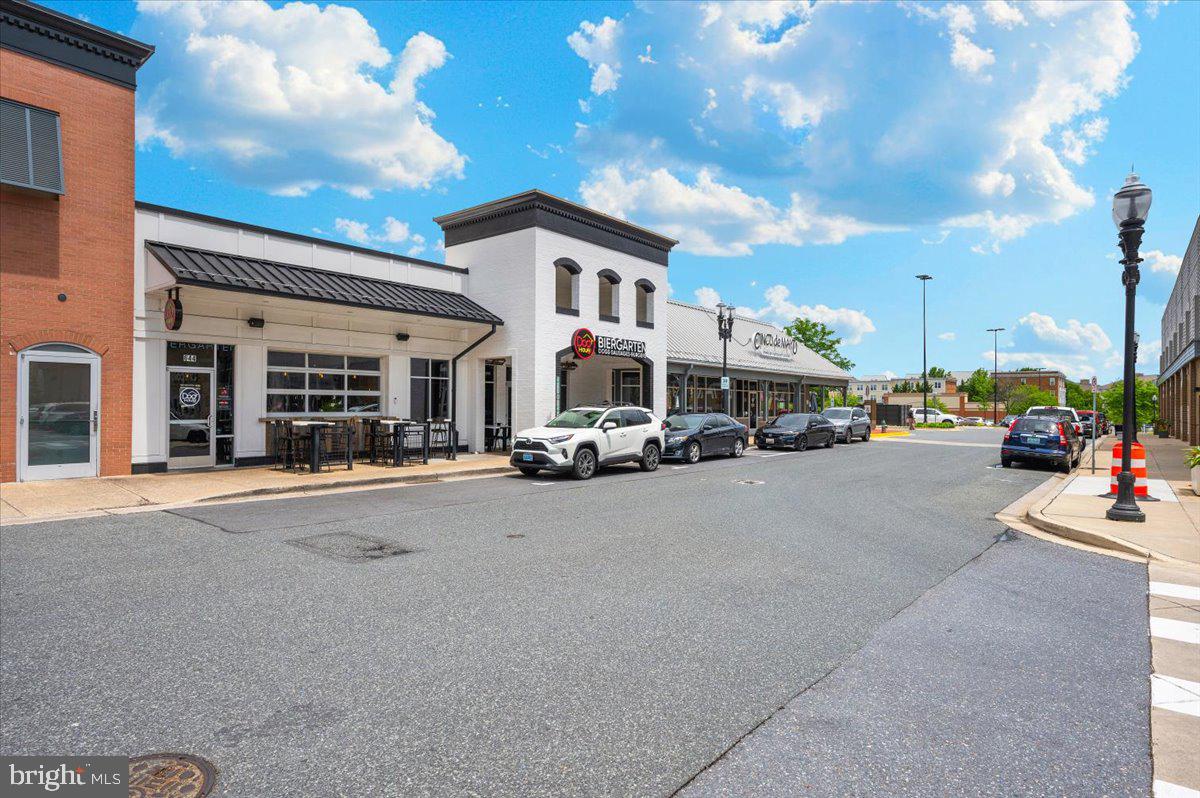 7 Booth Street, Unit 406 Gaithersburg, MD 20878 - Photo 110 of 117 a car parked in front of a building
