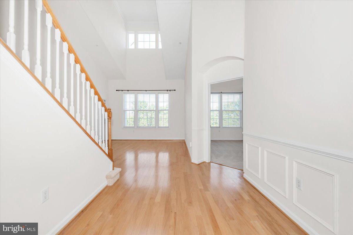 7 Booth Street, Unit 406 Gaithersburg, MD 20878 - Photo 19 of 117 a view of an entryway with wooden floor