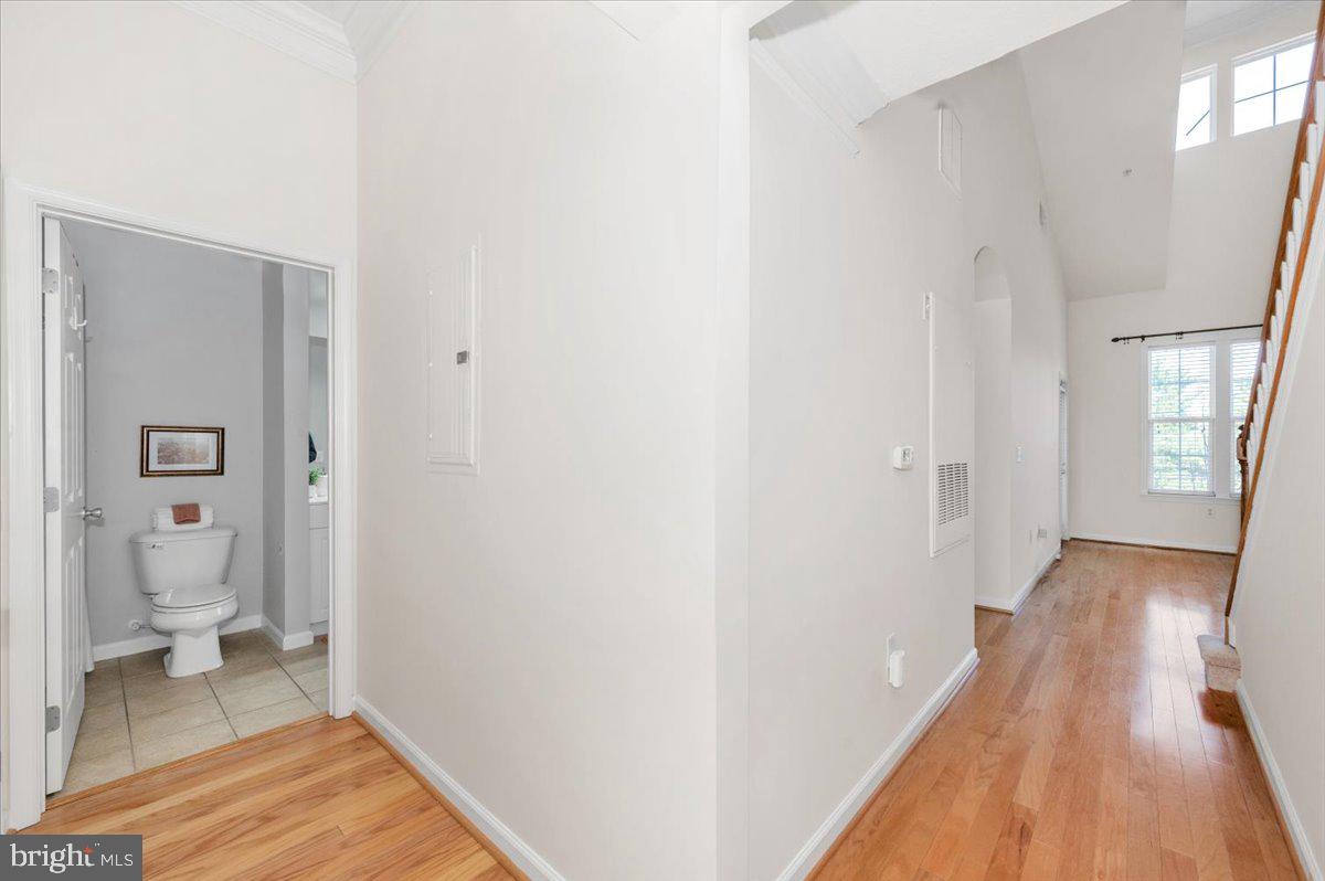 7 Booth Street, Unit 406 Gaithersburg, MD 20878 - Photo 26 of 117 a view of a room with wooden floor and a toilet