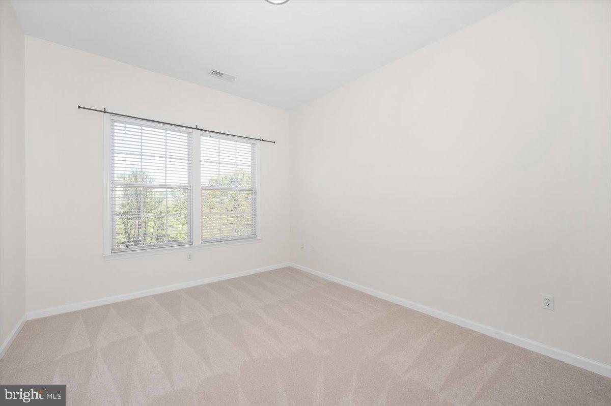 7 Booth Street, Unit 406 Gaithersburg, MD 20878 - Photo 29 of 117 Bedroom 1 with new carpet