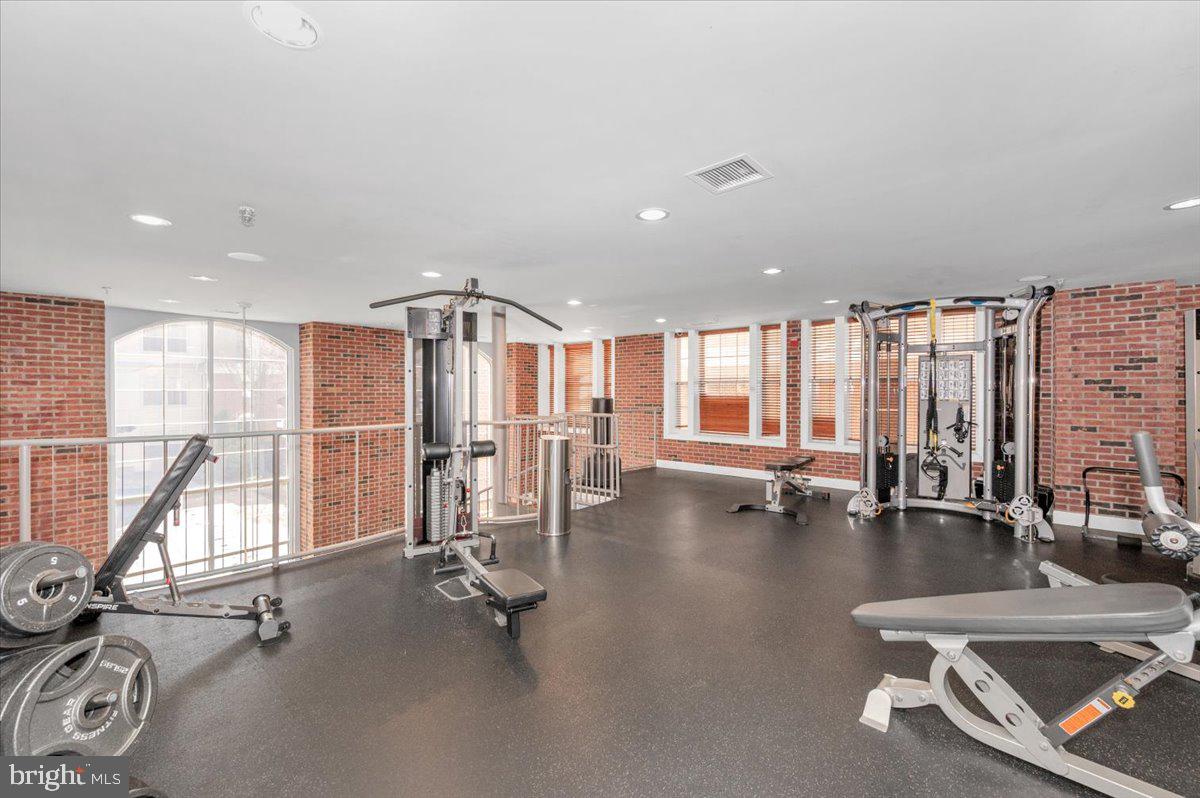 7 Booth Street, Unit 406 Gaithersburg, MD 20878 - Photo 51 of 117 a view of a room with gym equipment