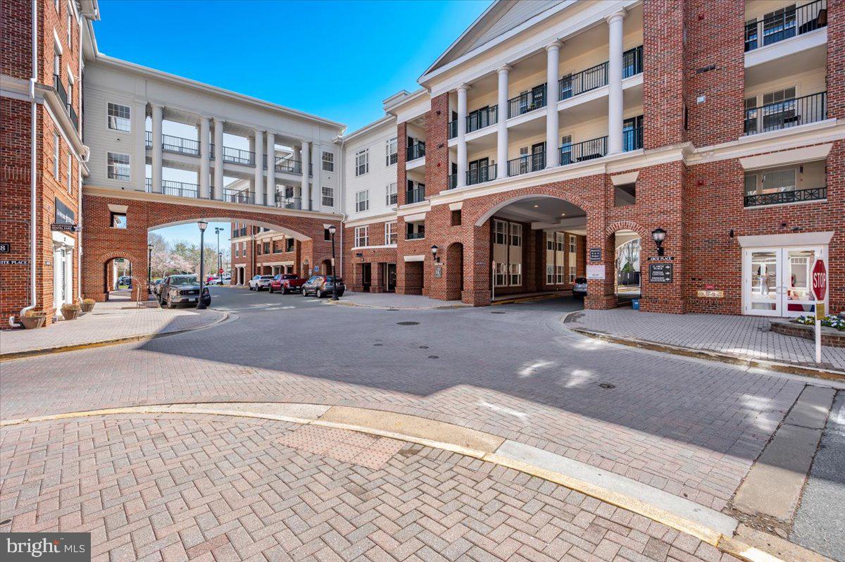 7 Booth Street, Unit 406 Gaithersburg, MD 20878 - Photo 72 of 117 a front view of a building with street view