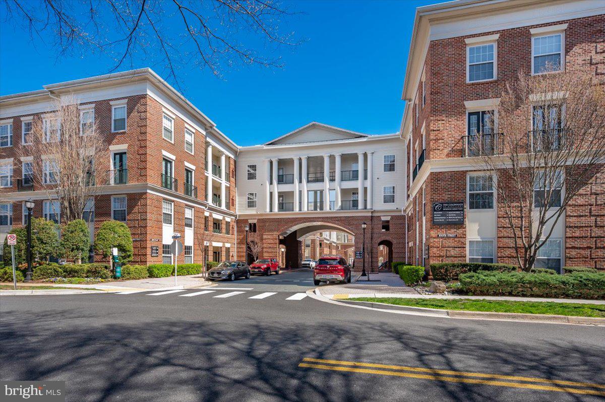 7 Booth Street, Unit 406 Gaithersburg, MD 20878 - Photo 78 of 117 a front view of a building with street view