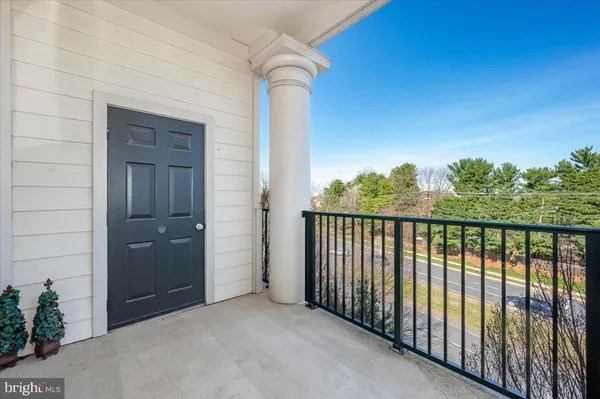 a kitchen with stainless steel appliances granite countertop a sink stove and microwave