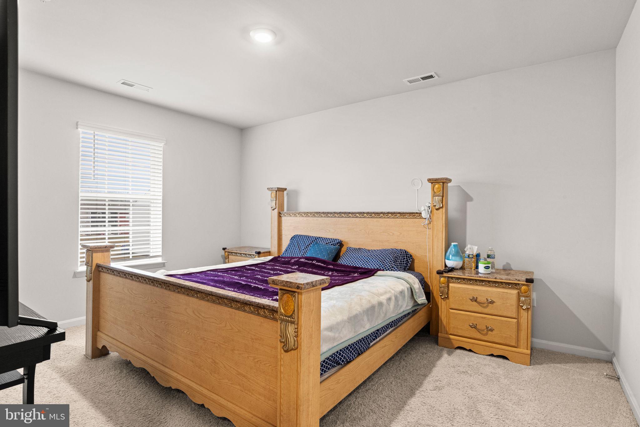 310 Maple Run Drive York, PA 17404 - Photo 13 of 28 a bedroom with a bed and a window