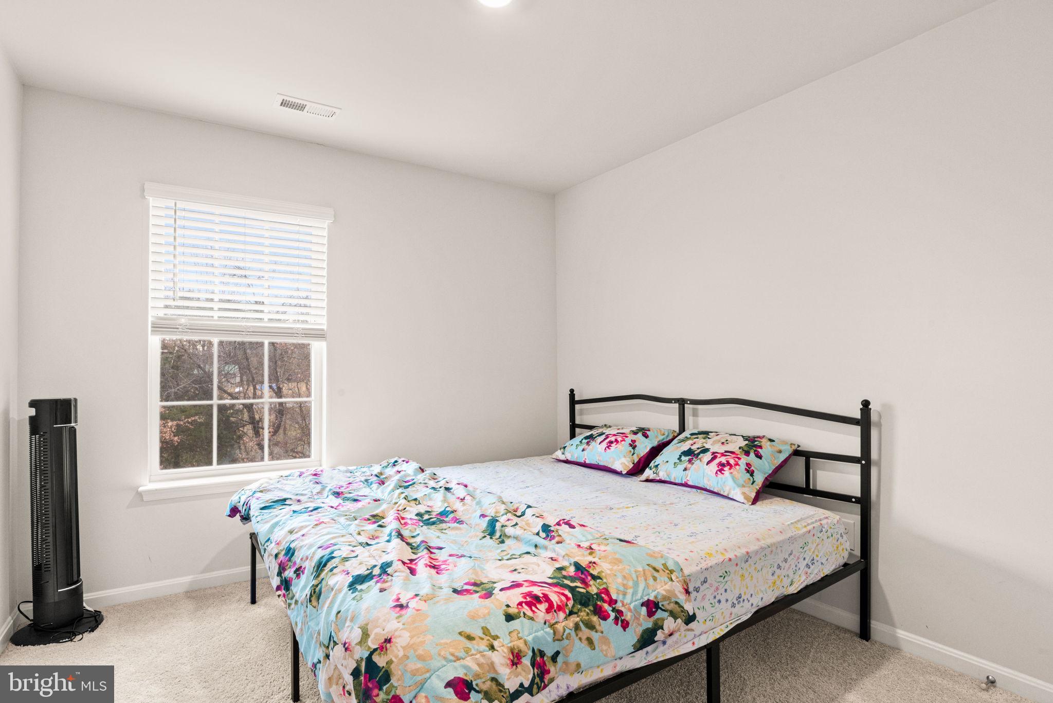 310 Maple Run Drive York, PA 17404 - Photo 18 of 28 a bedroom with a bed and a window