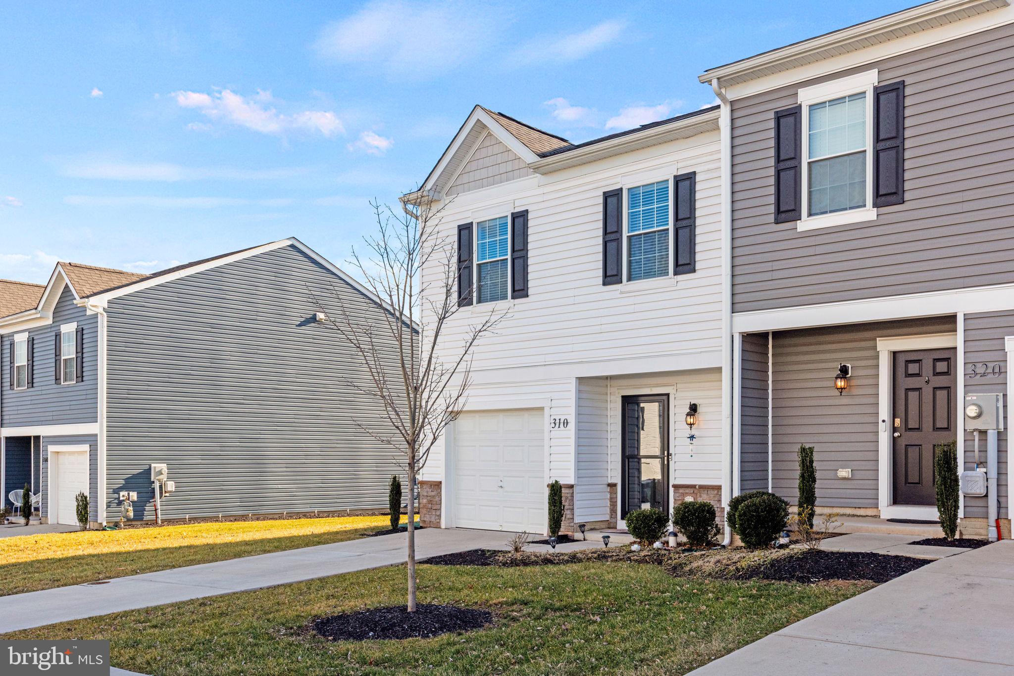 310 Maple Run Drive York, PA 17404 - Photo 28 of 28 a front view of a house with a yard