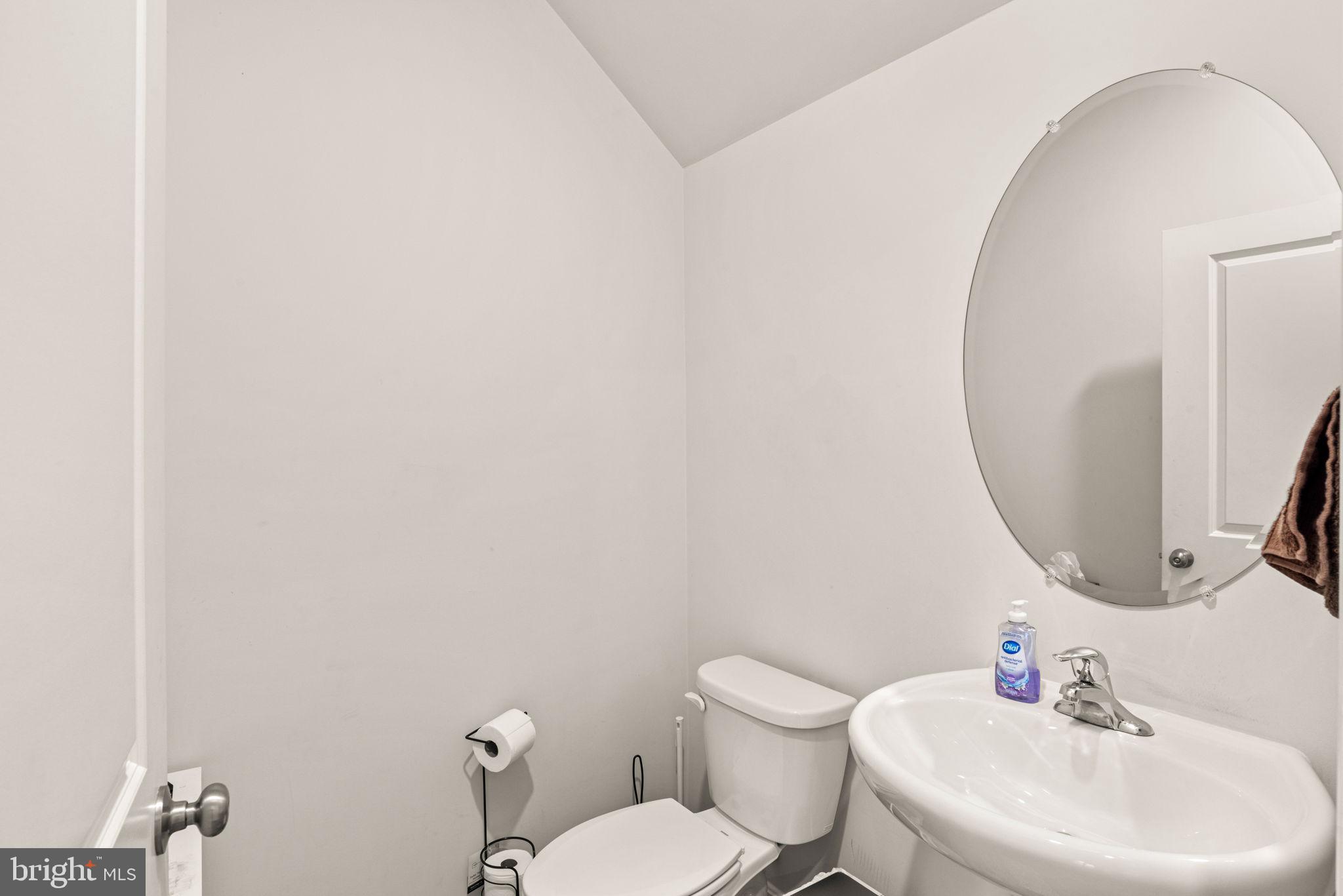 310 Maple Run Drive York, PA 17404 - Photo 4 of 28 a bathroom with a toilet sink and mirror