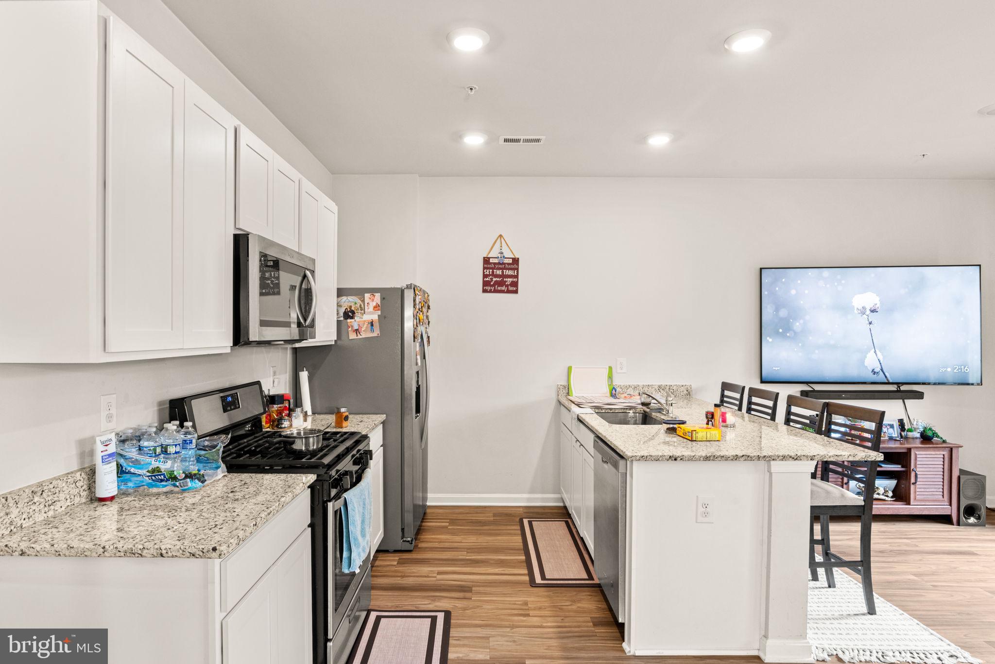 310 Maple Run Drive York, PA 17404 - Photo 6 of 28 a kitchen that has a lot of cabinets and refrigerator in it