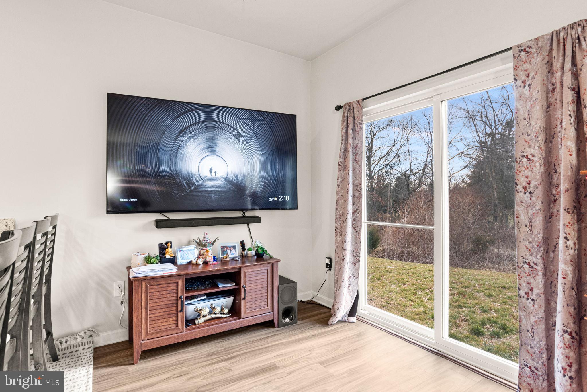 310 Maple Run Drive York, PA 17404 - Photo 8 of 28 a living room with furniture and a flat screen tv