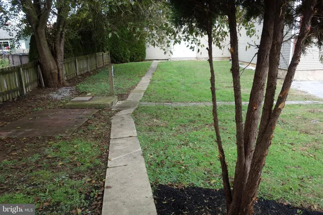 a view of a back yard of the house