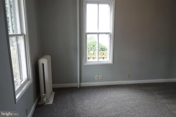 an empty room with a window
