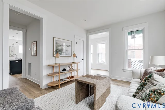 a spacious bedroom with a bed and a couch