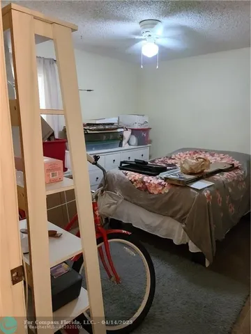 a view of balcony with two chairs and a table