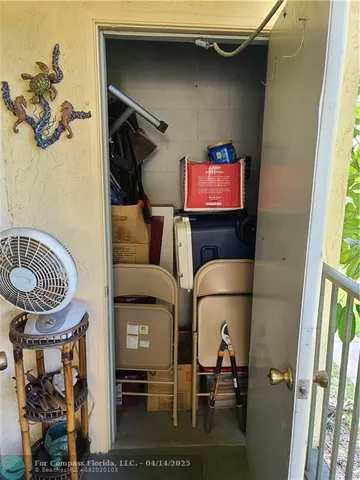 a bedroom with a bed and a mirror