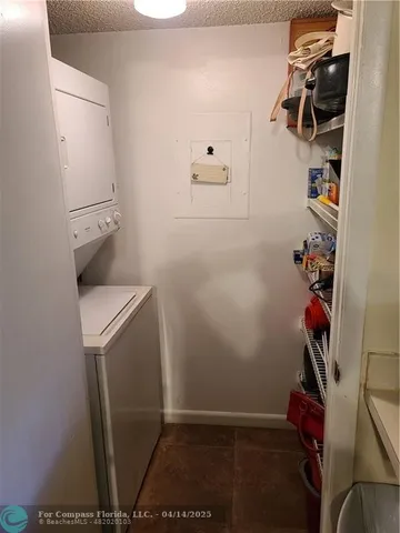 a view of a workspace with furniture