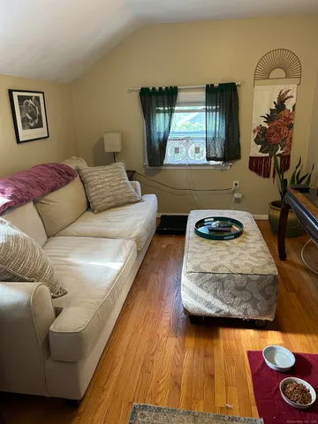 a living room with furniture and a couch