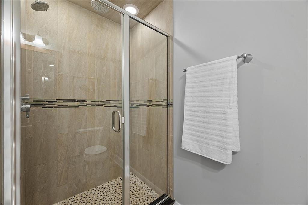 301 Fifth Avenue, Unit 506 Pittsburgh, PA 15222 - Photo 15 of 21 a bathroom with a shower
